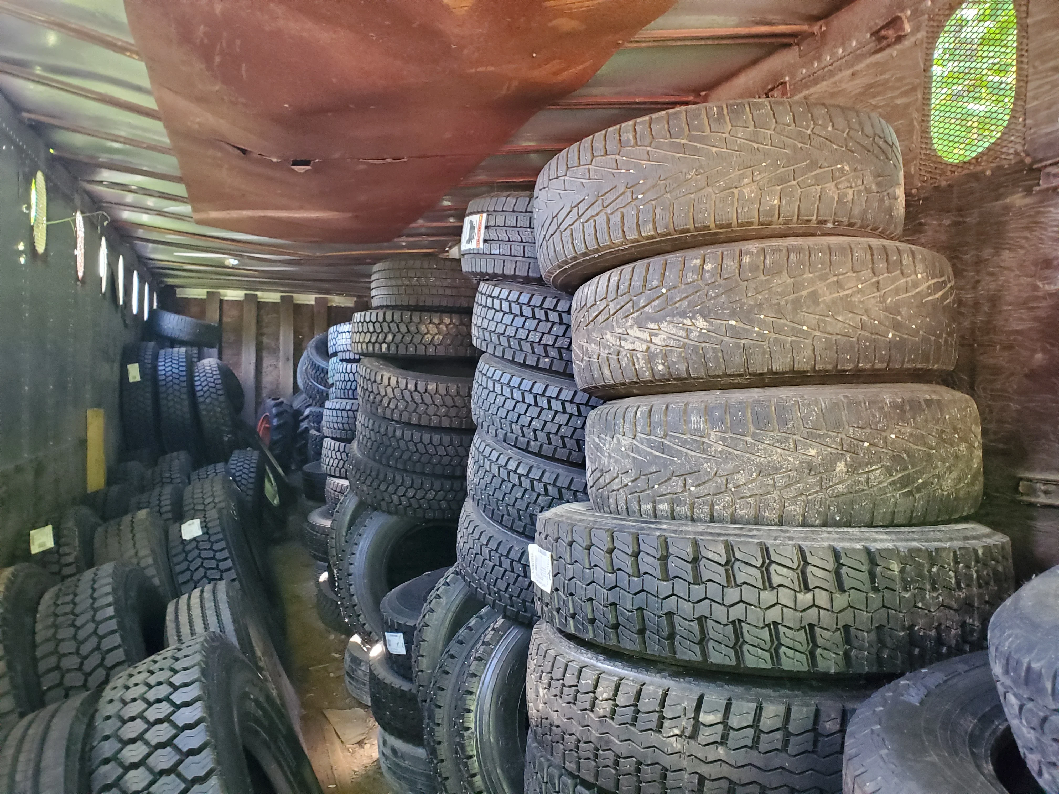 Truck Tires Stored Trailer