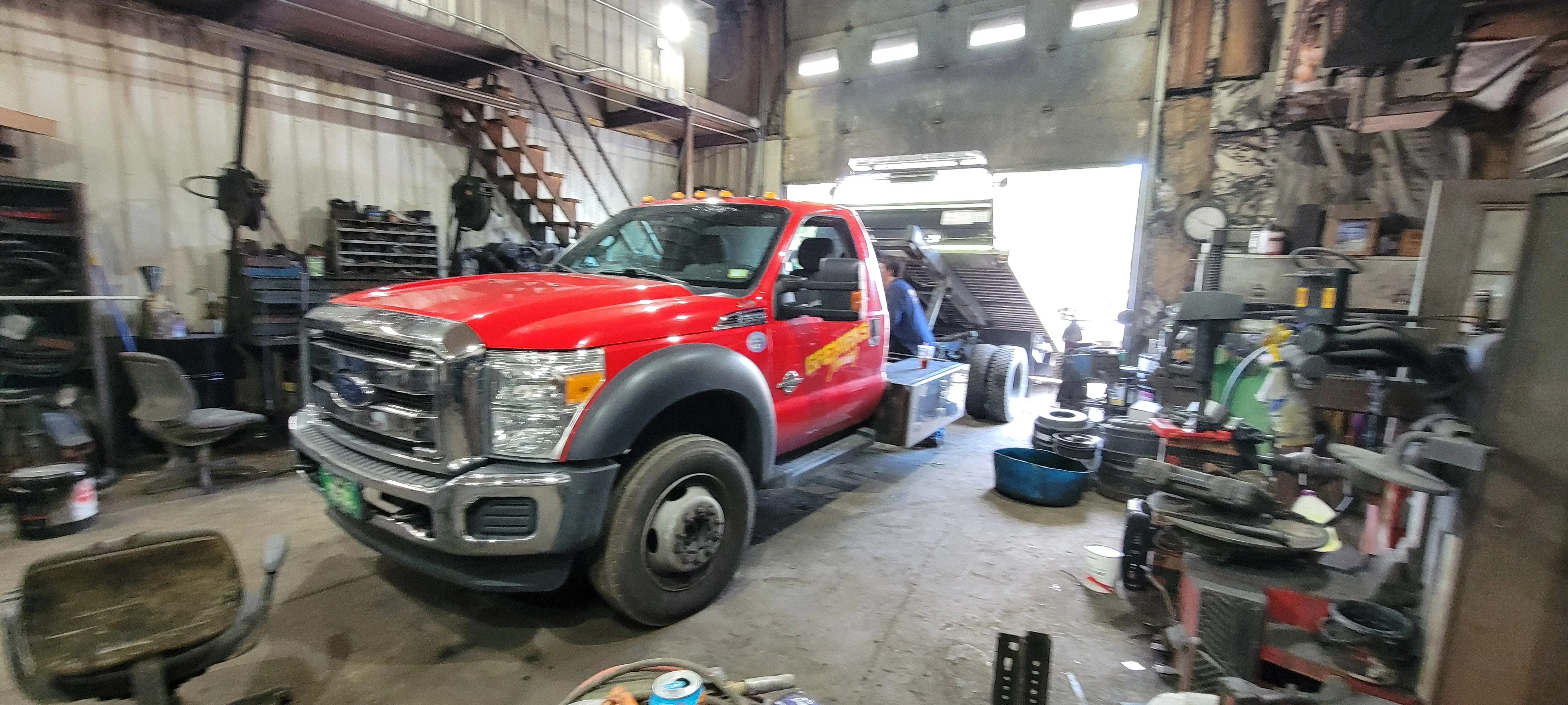 Red Tow Truck Repair Shop