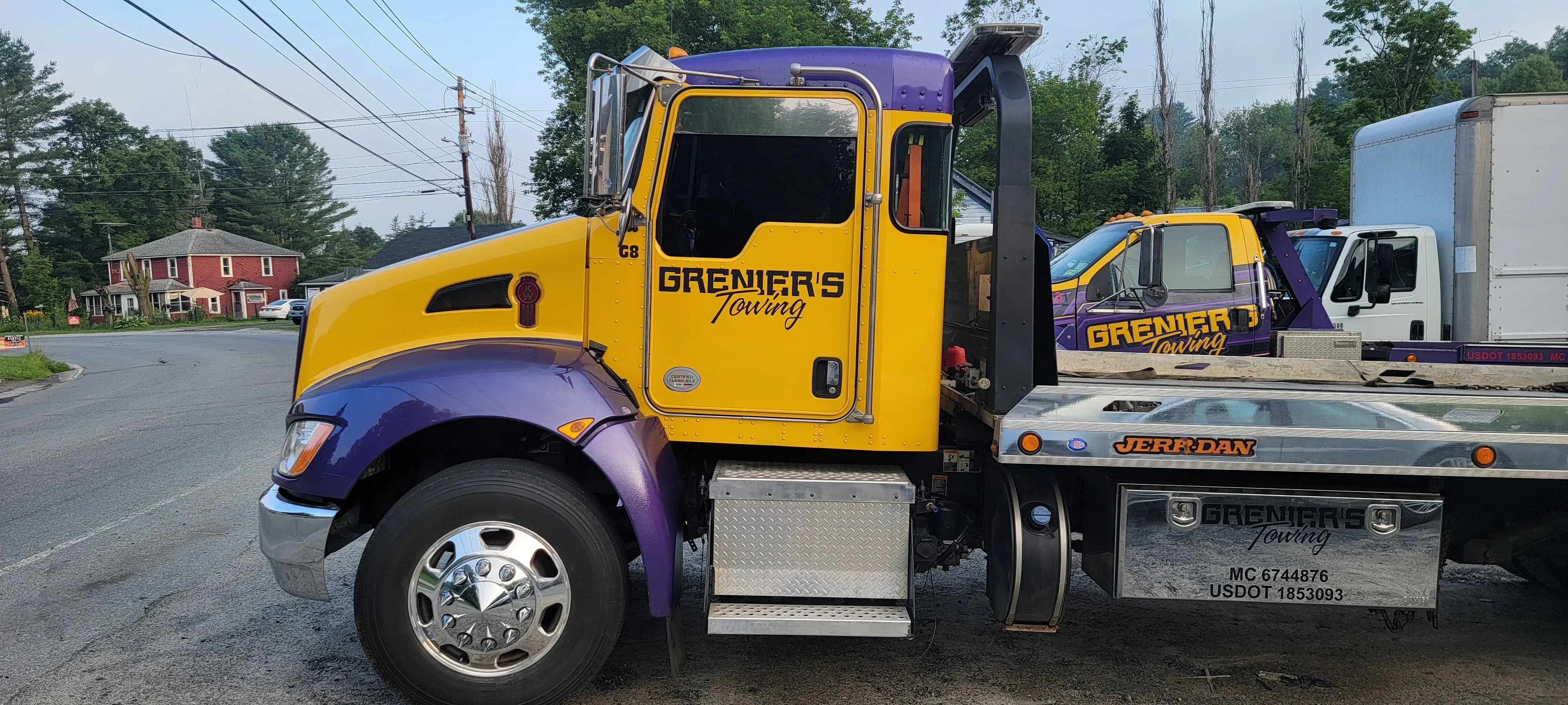Grenier's Towing Flatbed Truck