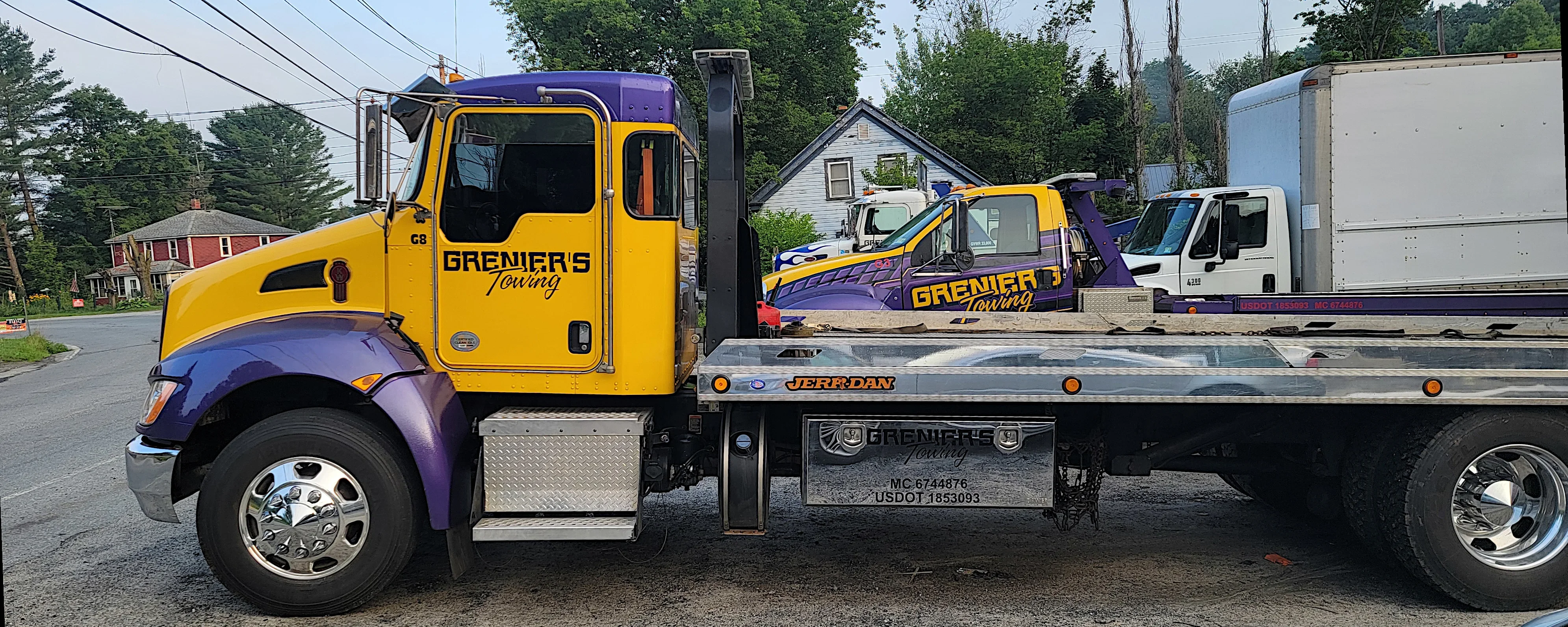 Grenier's Towing Flatbed Truck